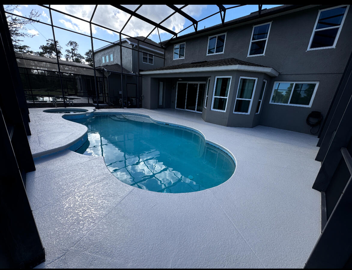 Freshly coated deck with crisp white finish &amp; clean edge detailing